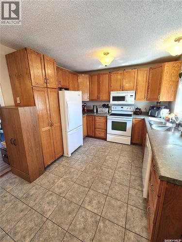 1330 8Th Street, Estevan, SK - Indoor Photo Showing Kitchen With Double Sink