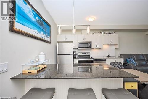 16 Concord Place Unit# 803, Grimsby, ON - Indoor Photo Showing Kitchen With Upgraded Kitchen
