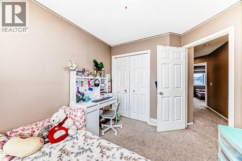 32 Saddlebrook Place Ne, Calgary, AB - Indoor Photo Showing Bedroom