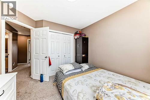 32 Saddlebrook Place Ne, Calgary, AB - Indoor Photo Showing Bedroom