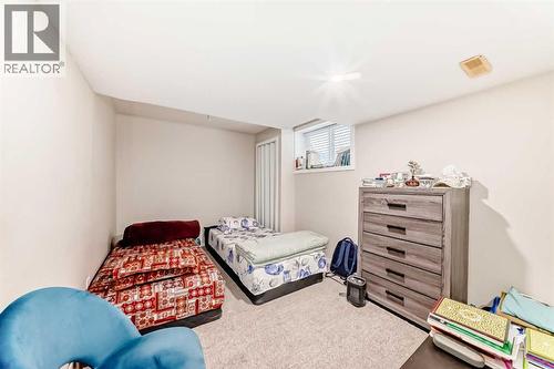 32 Saddlebrook Place Ne, Calgary, AB - Indoor Photo Showing Bedroom