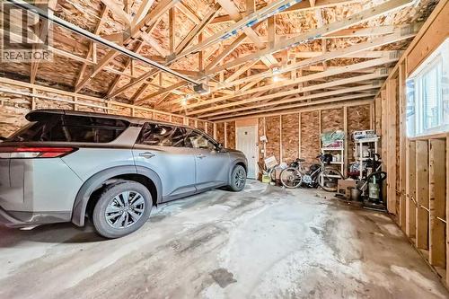 2 CAR GARAGE - 32 Saddlebrook Place Ne, Calgary, AB - Indoor Photo Showing Garage