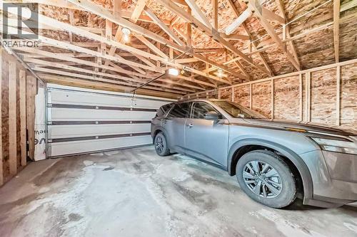 32 Saddlebrook Place Ne, Calgary, AB - Indoor Photo Showing Garage