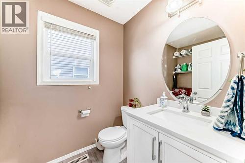MAIN HALF BATH - 32 Saddlebrook Place Ne, Calgary, AB - Indoor Photo Showing Bathroom