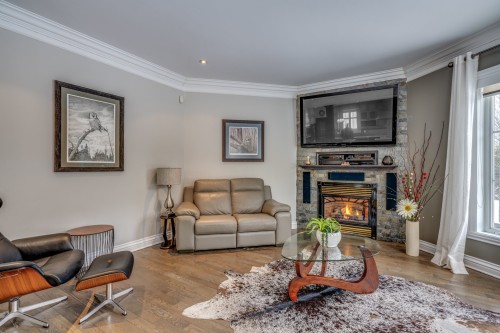 Salon - 45 Rue De Servando, Blainville, QC - Indoor Photo Showing Living Room With Fireplace