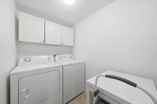 Salle de lavage - 101-124 Rue De Wolfe, Bromont, QC - Indoor Photo Showing Laundry Room