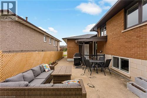 Living Room Walkout + Lower Level Walk Out - 142 Marcella Crescent, Hamilton, ON - Outdoor With Exterior