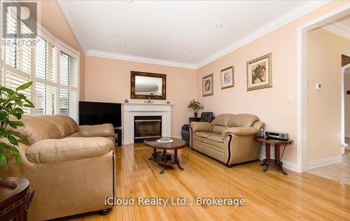 625 Laughren Crescent, Milton, ON - Indoor Photo Showing Living Room With Fireplace