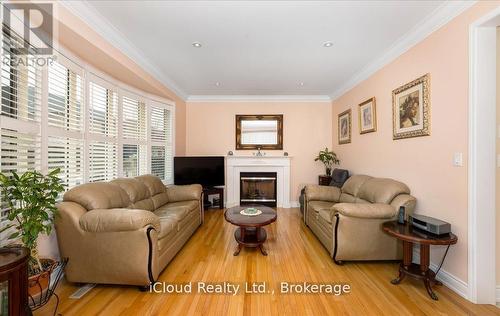 625 Laughren Crescent, Milton, ON - Indoor Photo Showing Living Room With Fireplace