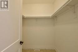 Primary Bedroom walk-in Closet - 
