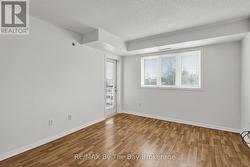 Bright living rm with walkout to balcony - 