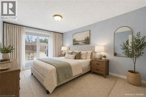 Expansive window with natural light and neutral-toned drapery - 299 Limeridge Ridge W Unit# 21, Hamilton, ON - Indoor Photo Showing Bedroom