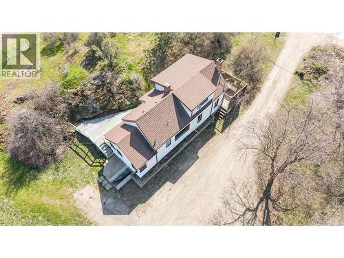 Aerial of 1942 farmhouse - 10091 6 Highway, Coldstream, BC 
