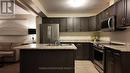 4451 Eclipse Way, Niagara Falls, ON  - Indoor Photo Showing Kitchen With Stainless Steel Kitchen With Double Sink 