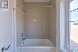 Main Bathroom tub with tile - 