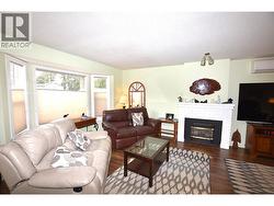 living room with a gas fireplace - 