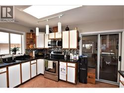 sliders to sunroom from the kitchen - 