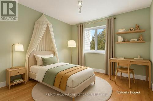 Cozy staged bedroom with workspace - 988 Lucille Way, Ottawa, ON - Indoor Photo Showing Bedroom