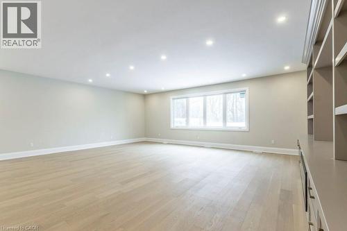 Unfurnished living room with light wood-type flooring and recessed lighting - 1105 Main Street E, Cambridge, ON - Indoor Photo Showing Other Room