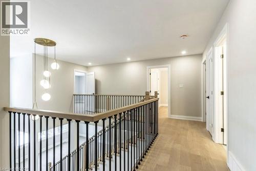 Corridor with light wood-type flooring, recessed lighting, and an upstairs landing - 1105 Main Street E, Cambridge, ON - Indoor Photo Showing Other Room