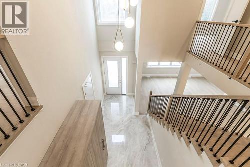 Entrance foyer with light marble finish flooring and a high ceiling - 1105 Main Street E, Cambridge, ON - Indoor Photo Showing Other Room