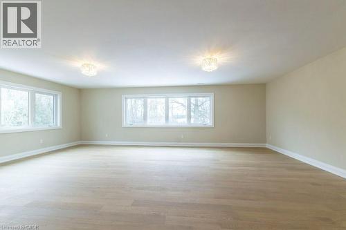 Unfurnished room with light wood finished floors and healthy amount of natural light - 1105 Main Street E, Cambridge, ON - Indoor Photo Showing Other Room