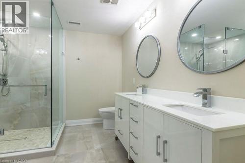 Bathroom featuring a stall shower, double vanity, and recessed lighting - 1105 Main Street E, Cambridge, ON - Indoor Photo Showing Bathroom
