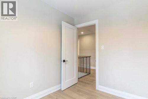 Empty room with light wood-type flooring and recessed lighting - 1105 Main Street E, Cambridge, ON - Indoor Photo Showing Other Room