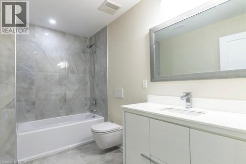 Full bathroom with vanity,  shower combination, and light marble finish floors - 1105 Main Street E, Cambridge, ON - Indoor Photo Showing Bathroom