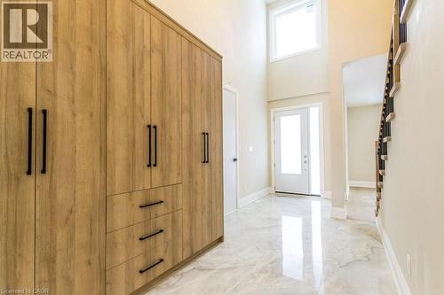 Entrance foyer featuring a high ceiling and light marble finish floors - 1105 Main Street E, Cambridge, ON - Indoor Photo Showing Other Room