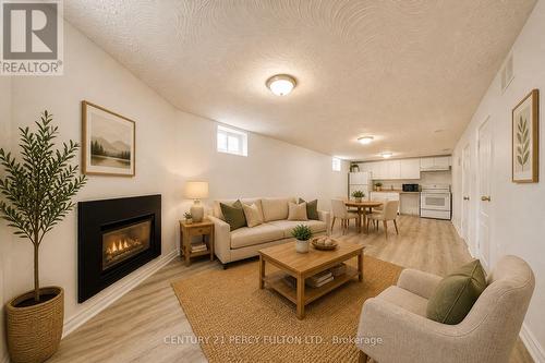 Virtually Staged - 381 Conant Street, Oshawa, ON - Indoor Photo Showing Living Room With Fireplace