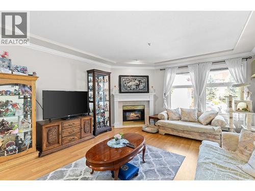3300 Centennial Drive Unit# 204, Vernon, BC - Indoor Photo Showing Living Room With Fireplace