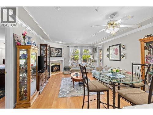 3300 Centennial Drive Unit# 204, Vernon, BC - Indoor Photo Showing Dining Room With Fireplace