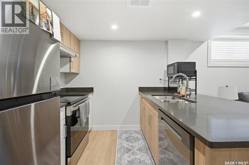 159 Doran Way, Saskatoon, SK - Indoor Photo Showing Kitchen With Double Sink