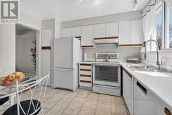 Ample cabinet space in this incredible kitchen! - 
