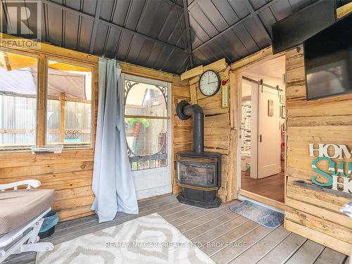 3412 Locust Street, Port Colborne (Sherkston), ON - Indoor Photo Showing Other Room With Fireplace