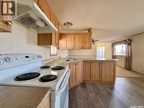 427 Vincent Avenue W, Churchbridge, SK - Indoor Photo Showing Kitchen With Double Sink