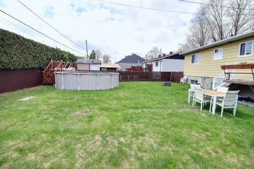 Cour - 408 Rue Lauzanne, Saint-Eustache, QC - Outdoor With Above Ground Pool