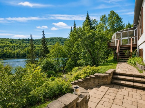 Terrasse - 605 Ch. De Montfort, Saint-Adolphe-D'Howard, QC - Outdoor With Body Of Water