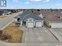 201 Brookside Court, Warman, SK  - Outdoor With Facade 