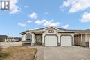 201 Brookside Court, Warman, SK  - Outdoor With Facade 