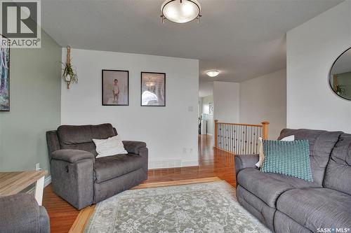 201 Brookside Court, Warman, SK - Indoor Photo Showing Living Room