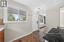 Entryway featuring tile flooring, a white paneled door with leaded glass insert, and a contemporary flush-mount ceiling light - 34 Avenue Road, Cambridge, ON  - Indoor 