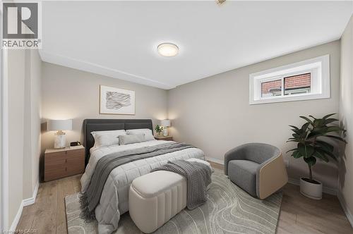 Bedroom featuring neutral wall tones and wood-finish flooring - 34 Avenue Road, Cambridge, ON - Indoor Photo Showing Bedroom