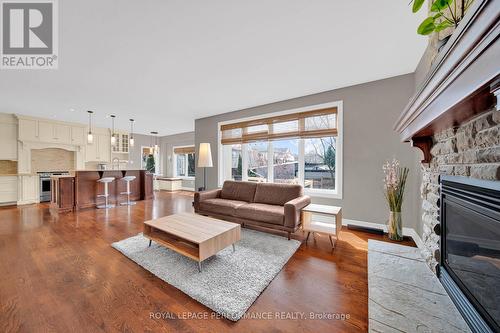 590 Kochar Drive, Ottawa, ON - Indoor Photo Showing Living Room With Fireplace