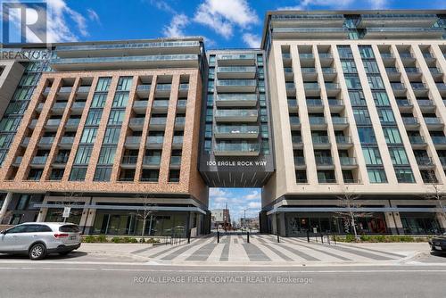 407 - 100 Eagle Rock Way, Vaughan, ON - Outdoor With Balcony With Facade