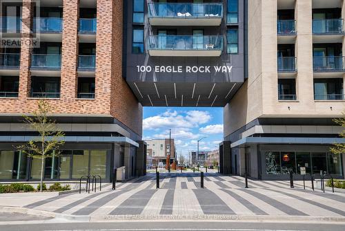 407 - 100 Eagle Rock Way, Vaughan, ON - Outdoor With Balcony With Facade