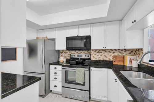 278-3 Everson Drive, Toronto, ON - Indoor Photo Showing Kitchen With Double Sink