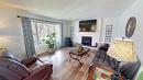 409 22Nd Avenue, Cranbrook, BC  - Indoor Photo Showing Living Room With Fireplace 