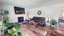 409 22Nd Avenue, Cranbrook, BC  - Indoor Photo Showing Living Room With Fireplace 
